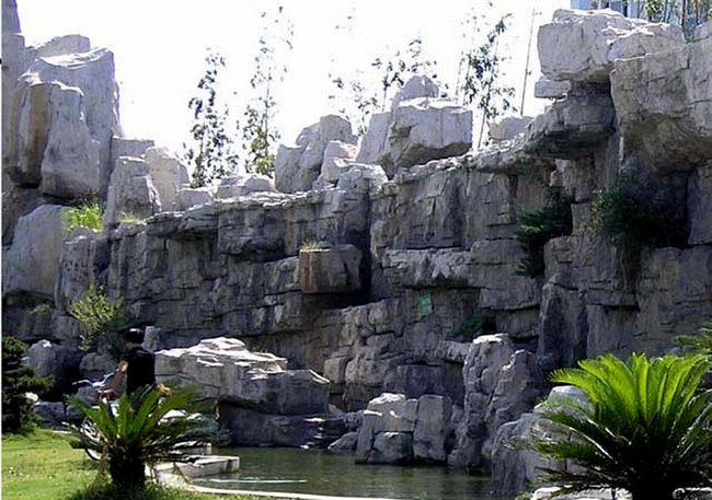 重慶大型假山景觀與塑石瀑布設計規(guī)劃與公園假山制作