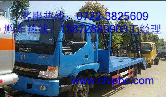 供應(yīng)拉小型挖機(jī)的東風(fēng)勁卡平板運(yùn)輸車圖