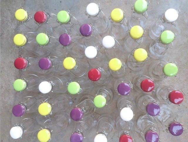 供應(yīng)提手奶瓶玻璃飲料瓶批發(fā)多少錢