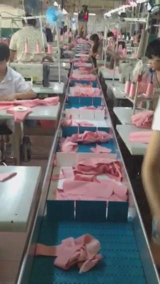 服裝電動(dòng)履帶節(jié)拍流水線(xiàn)圖片