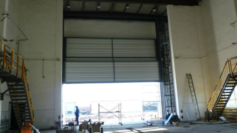 供應(yīng)榆林市北斗門業(yè)提升門價(jià)格